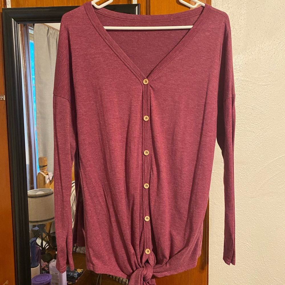 Size medium button down long sleeve blouse!